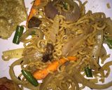 A picture of step 1 of Yam balls with noodles and fried egg.