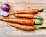 A picture of step 1 of Warm carrot, mangetout and coriander salad.