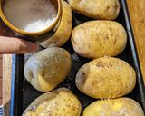 A picture of step 1 of Baked jacket potatoes.