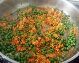 Foto del paso 3 de la receta: Arroz con guisantes y jamón