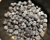 A picture of step 6 of Lemon Pepper Chicken with a Blueberry Orange Wine Sauce.