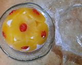 A picture of step 7 of Pineapple Dome Cake.