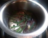 A picture of step 1 of Herbal jaggery tea.