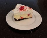 A picture of step 26 of White Chocolate Cherry Truffle Cheesecake.