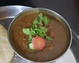 A picture of step 8 of Chhole (chickpeas).