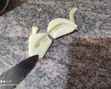 Foto del paso 3 de la receta: Merluza con ajo, perejil y patatas panaderas en 22 minutos