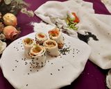 A picture of step 6 of Dhokla sushi with Bell peppers.