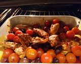 A picture of step 4 of Harissa chicken with olives and tomatoes.