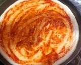 A picture of step 2 of Chicken tikkka pizza.