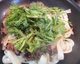 A picture of step 4 of Yaki Udon with Kishimen Noodles and Chrysanthemum Greens.