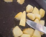 A picture of step 3 of Potato Paneer curry.