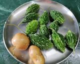 A picture of step 2 of Crispy Karela (Bitter gourd) potatoes.