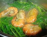 Hình bước làm 3 của món Canh rau muống nấu tôm càng xanh chua cay