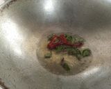 A picture of step 4 of Stuffed brinjal and potatoes masalas.