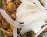 Foto del paso 4 de la receta: Tostadas de pollo, rajas, elote y mole