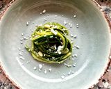 A picture of step 6 of Zucchini Spaghetti with Basil Pesto, Crumbled Feta, Almonds, and Pine Nuts.