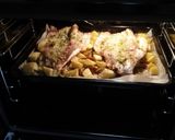 Foto del paso 7 de la receta: Lubina al horno sobre cama de cebolla, papas y tomates cherry