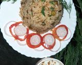 A picture of step 4 of Matar pulau with dill leaves.