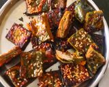 A picture of step 4 of Arbi leaves crispy squares.