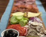 A picture of step 1 of Subway at home/ sub board.