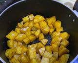 A picture of step 2 of Achari Dum Aloo.