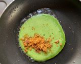 A picture of step 5 of Patishapta with a spinach purée.