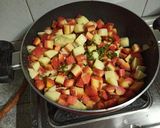 A picture of step 9 of Gajar Aloo Matar.