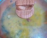 Foto del paso 6 de la receta Muslos de pollo en salsa de limón, azafrán y ajos tiernos