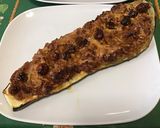 Une image de l'étape 9 de Courgette géante farcie sucrée salée au bœuf, pommes, tomates cerises et fromages.