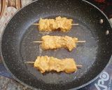 A picture of step 15 of Chicken tandoori tikka boti in frying pan.