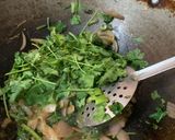 A picture of step 2 of Fried idli in Palak gravy.