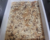 Foto del paso 8 de la receta: Pastel cuajada de bizcochos, manzanas y piñones