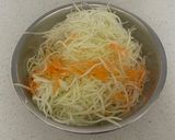 A picture of step 1 of Som tum (Thai green papaya salad).