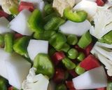 A picture of step 1 of Kolhapuri Mixed Veg Curry.