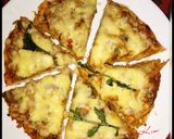 A picture of step 4 of Stove Top Chicken Tikka Pizza.