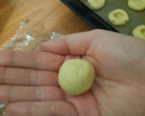 A picture of step 4 of Jam Thumbprint cookies.