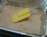 A picture of step 3 of No bake pumpkin cake.