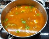 Foto del paso 5 de la receta: Guisado de calamarcitos y patatas