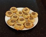 A picture of step 12 of Coconut Cream Thumbprint Shortbread Cookies.
