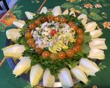 Une image de l'étape 8 de Salade de cresson aux jeunes endives, tomates cerises et persil.