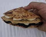 A picture of step 4 of Banana and Nutella tortilla wrap.