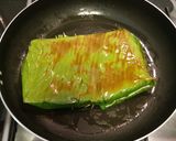 A picture of step 13 of Paneer wrapped in banana leaf.