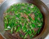 Foto langkah ke 4 dari resep Tumis Pare Cabai Hijau.