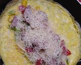 Foto langkah ke 3 dari resep Omelet Isi simple.