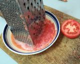 Foto del paso 2 de la receta Chipirones y langostinos con sofrito de tomate