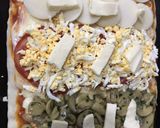Foto del paso 4 de la receta: Pizza casera 🍕con todo