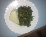 A picture of step 9 of Ugali served with fried spinach  mixed with beef meat.