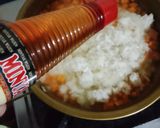 Foto langkah ke 2 dari resep Bubur ayam wortel rosella.