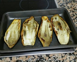 Foto del paso 3 de la receta: Berenjenas al horno rellenas de ajos tiernos y beicon