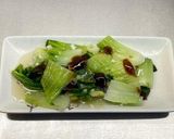 A picture of step 8 of Steamed tofu with sweet soy dressing sauce and spring onions.